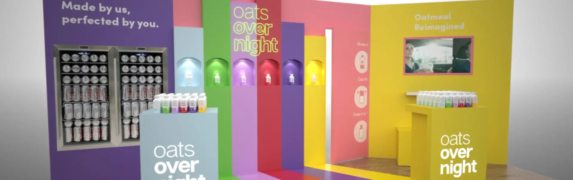 Colorful Oats Overnight trade show booth designed by Highway 85 Creative featuring product displays and sampling stations