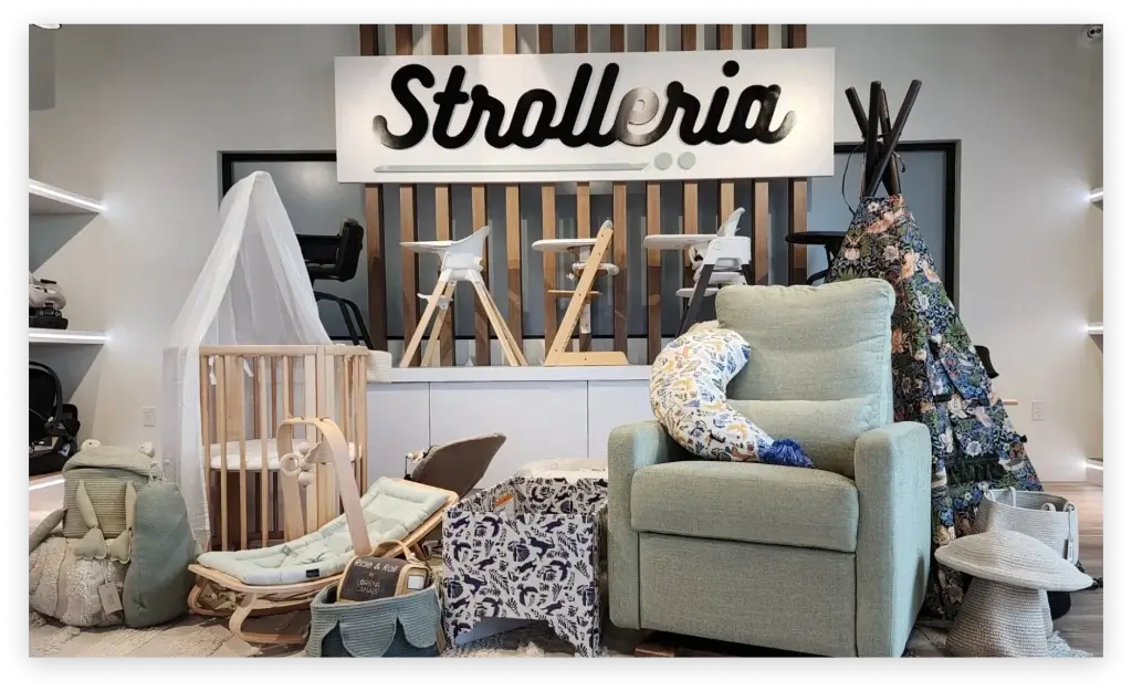 Close-up of Strolleria's brand colors and elements integrated into showroom design.