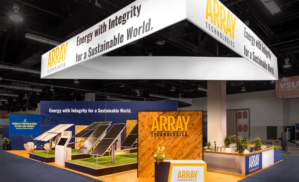 Attendees experiencing the immersive design of the Array Technologies trade show booth.